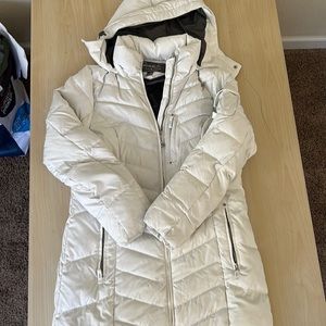 Women’s white Eddie Bauer jacket.